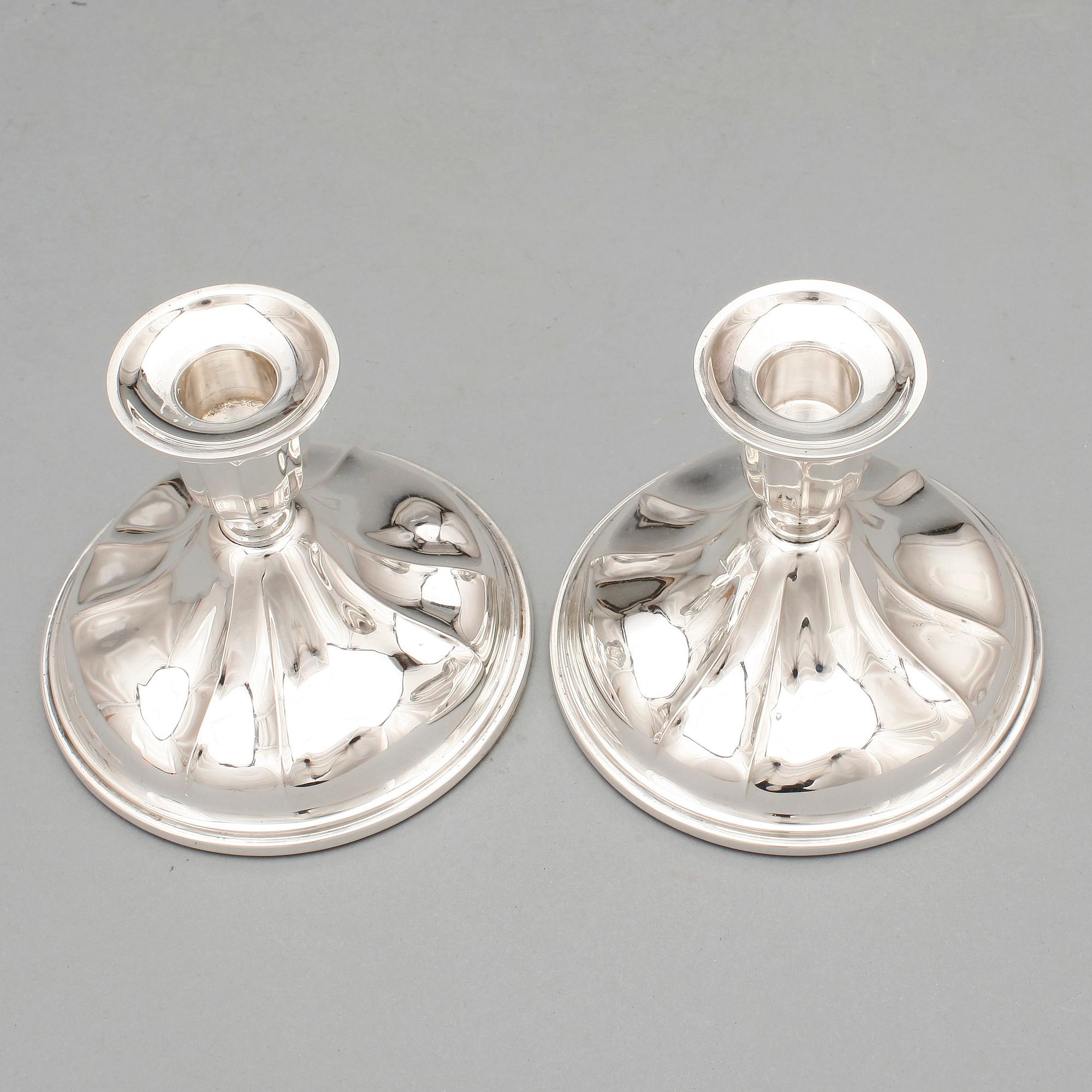 LJUSSTAKAR, ett par, silver, Norge, 1900-talets första hälft.