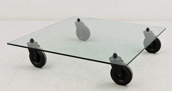 A Gae Aulenti 'Tavola con Ruote' table, Fontana Arte, Italy.