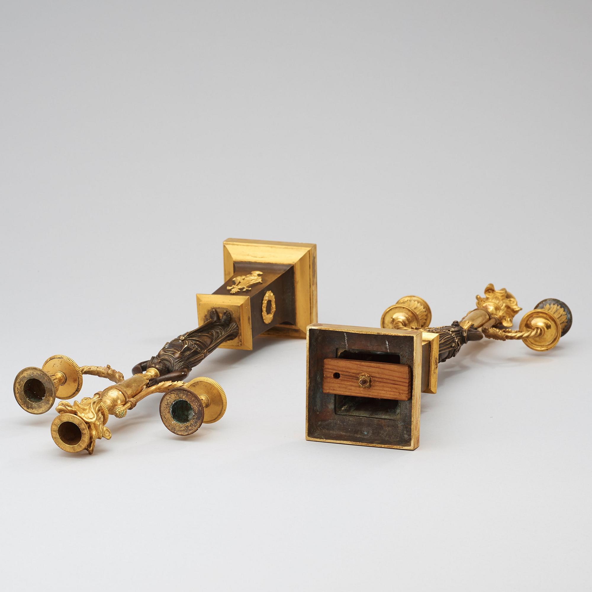 A pair of  Empire early 19th century three-light candelabra.