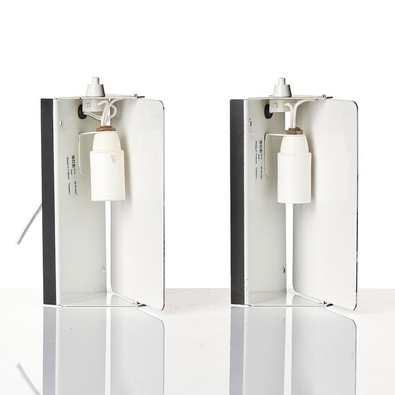 Charlotte Perriand, a pair of wall lights model "CP1", La Société Centrale d'Eclairage, France, 1960s.