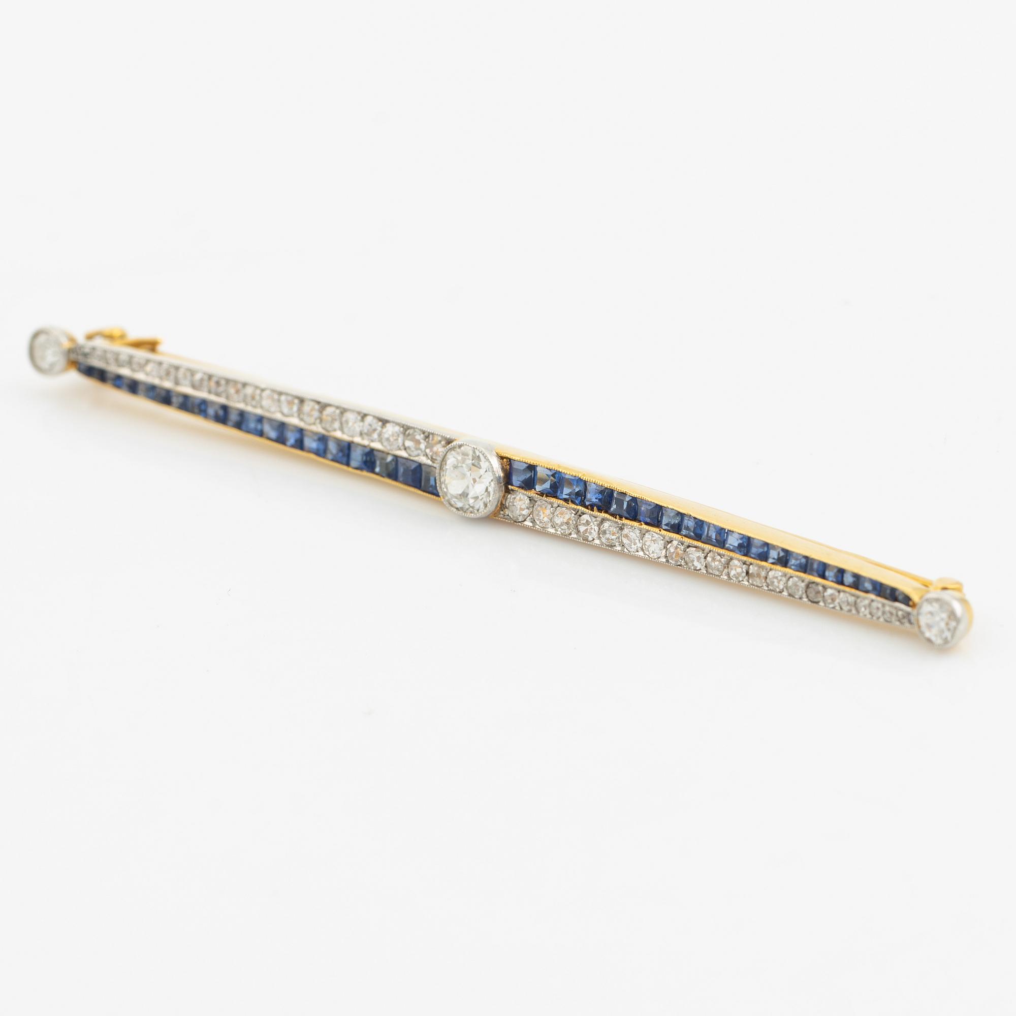 Brosch, gold with old-cut diamonds and princess-cut sapphires.