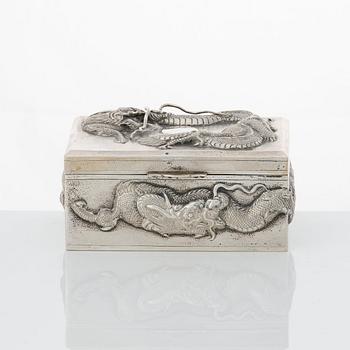 A set with 2 Chinese silver boxes, a coaster and a match stick holder, 20th Century.