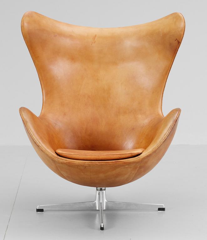 An Arne Jacobsen brown leather 'Egg Chair' by Fritz Hansen, Denmark 1964.