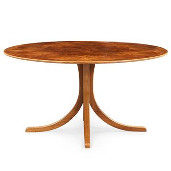 A Josef Frank mahogany and burled wood dining table, Svenskt Tenn, model 1020.