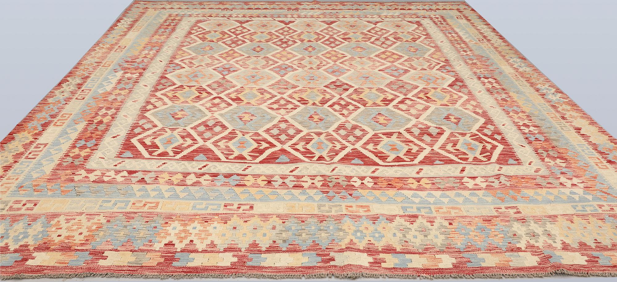 A Kilim carpet, approx. 379 x 313 cm.