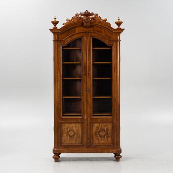 A mahogany veneered book cabinet ,second part of the 19th Century.