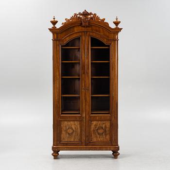 A mahogany veneered book cabinet ,second part of the 19th Century.