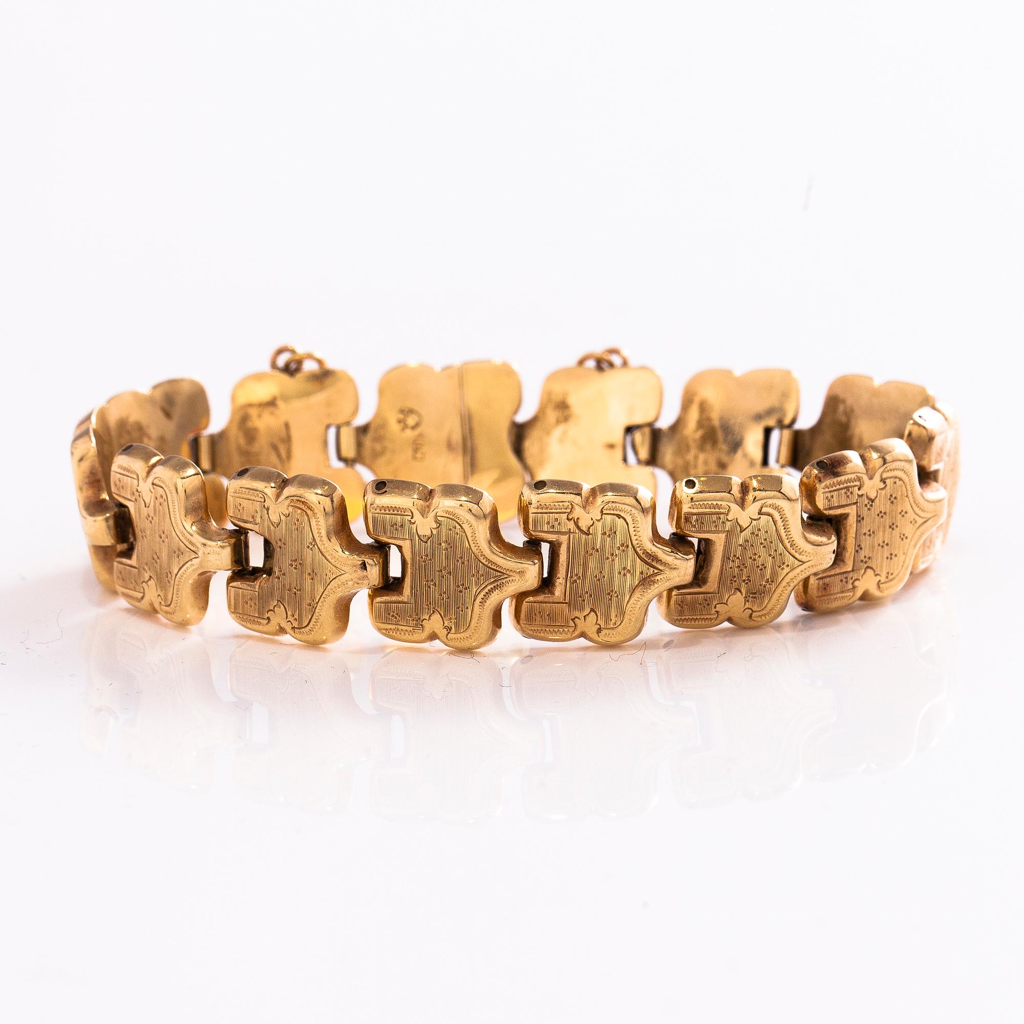 BARNARMBAND, 14K guld, mästare Carl Ernst (Ernest), S:t Petersburg 1848.