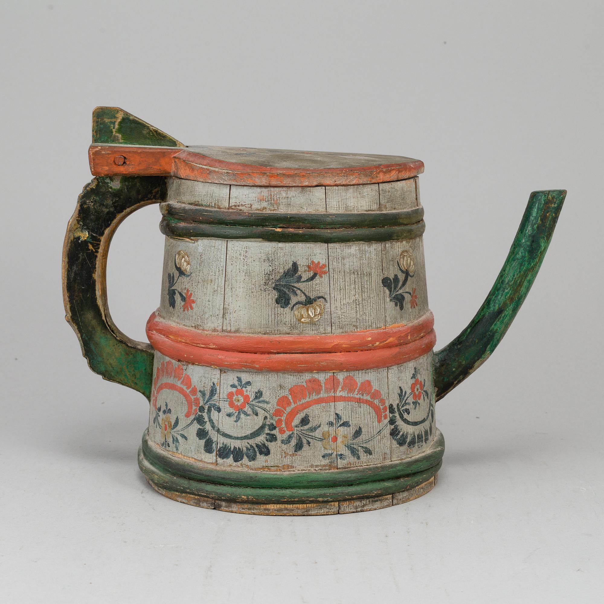 A painted wooden jar from the 19th century.