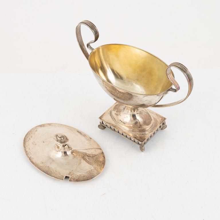 A Swedish silver sugarbowl and a spoon, mark of Svea Svensson, Stockholm 1909.