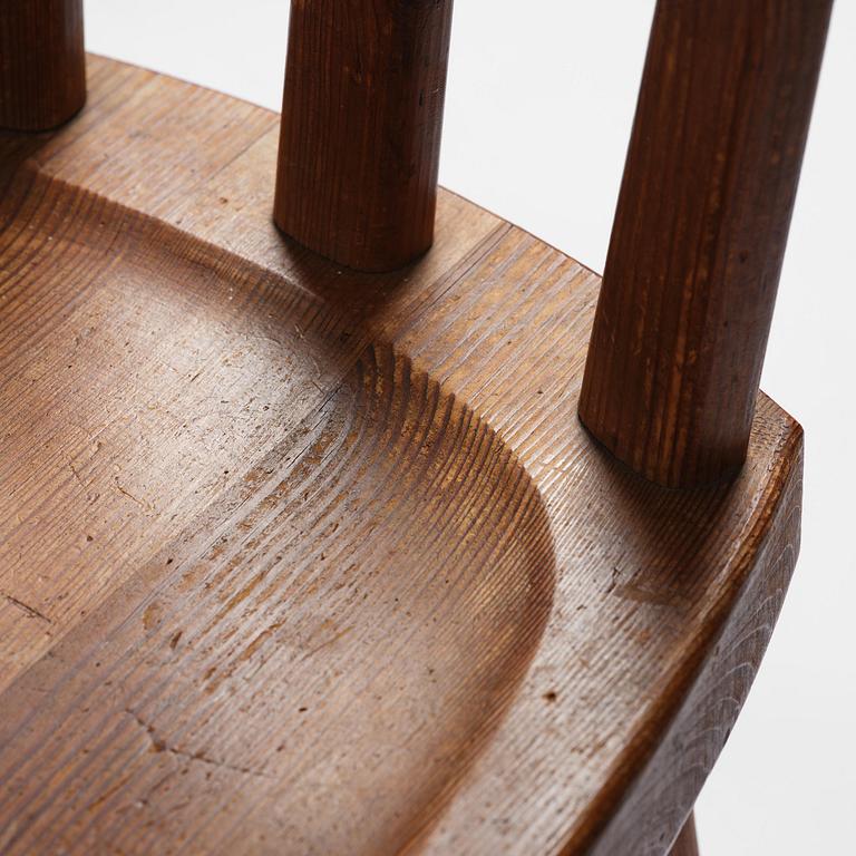 Axel Einar Hjorth, a set of three stained pine "Utö" chairs, Nordiska Kompaniet, Sweden, 1930s.