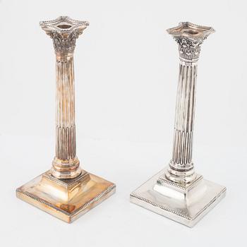A pair of silver plated candle sticks, early 20th Century.