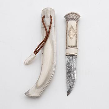 A reindeer horn knife by Bertil Fällman, signed.