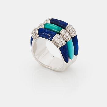 988. A Paul Binder ring in 18K white gold set with lapis lazuli, turquoise and round brilliant-cut diamonds.