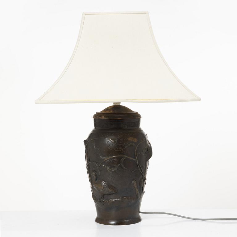 A Japanese bronze table lamp, 20th century.