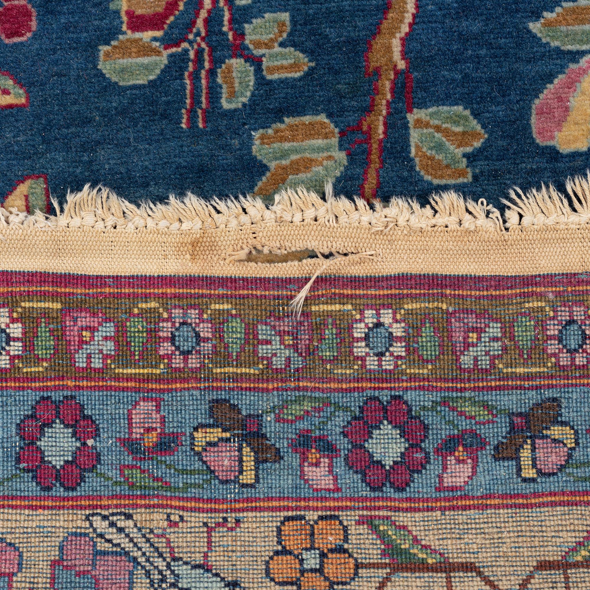 Rug, likely Tehran, approximately 227 x 133 cm.