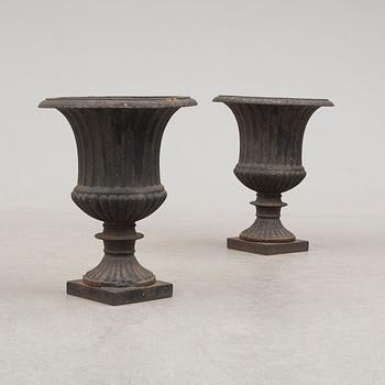 A pair of cast iron plant pots. Second half of the 20th century.