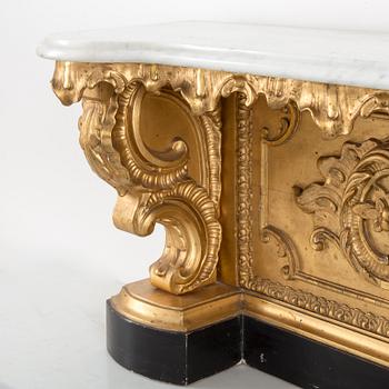 A late 19th century console table with a marble top.