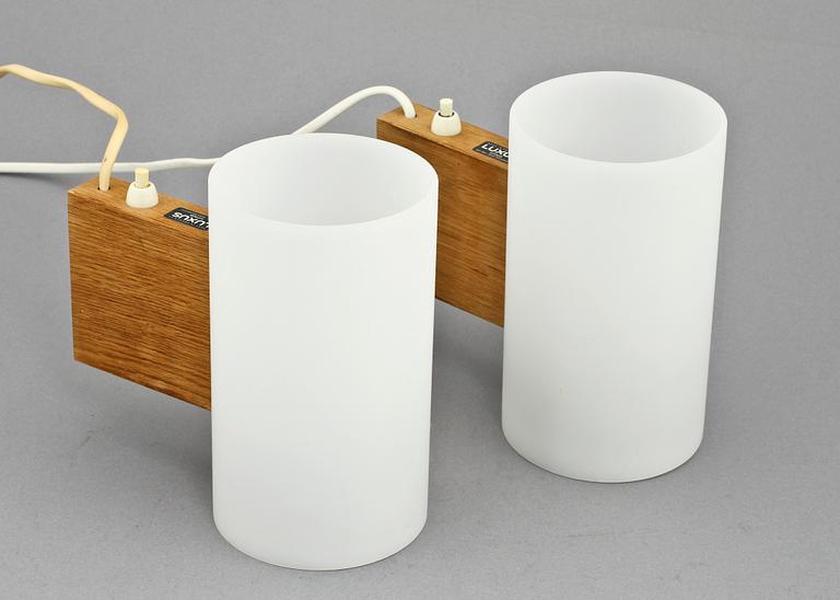 VÄGGLAMPOR, ett par, Uno och Östen Kristiansson, Luxus, 1900-talets andra hälft.