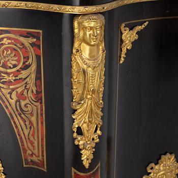 A Boulle style cabinet, the end of the 19th century.
