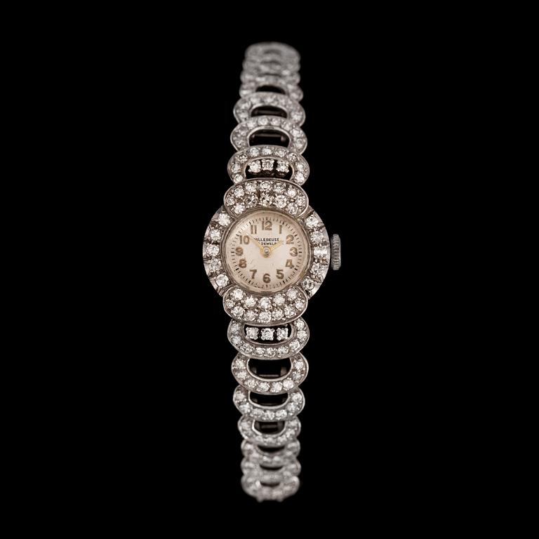 A diamond ladie's wrist watch, tot. app. 2 cts.