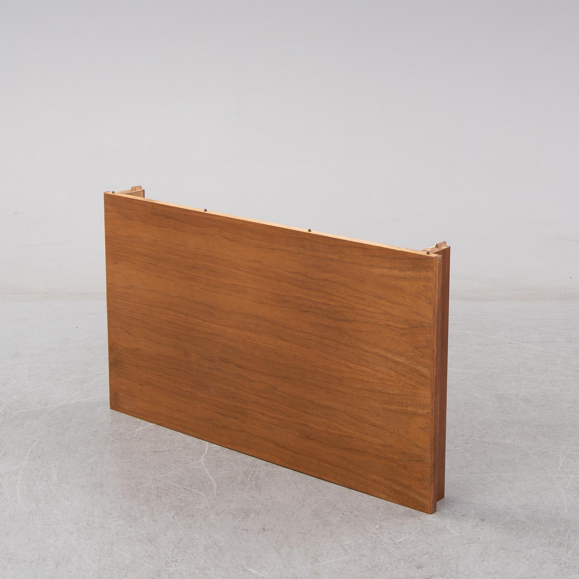 A five-piece walnut 'Ambassadör' dining suite by Carl Malmsten.