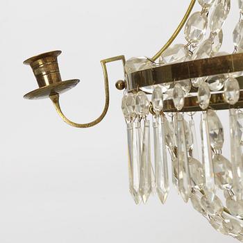 A four-branch Gustavian style chandelier, mid 20th century.
