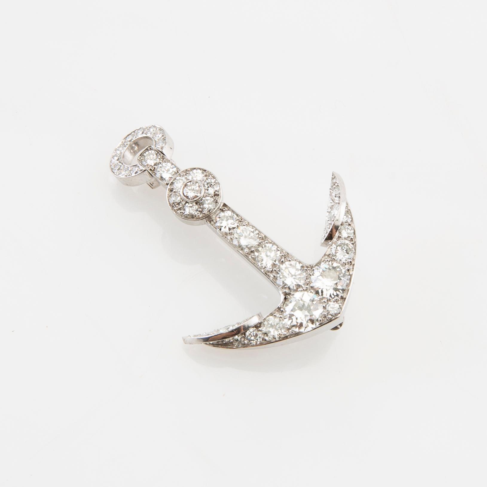 Brooch in the form of an anchor made of 18K white gold with diamonds.