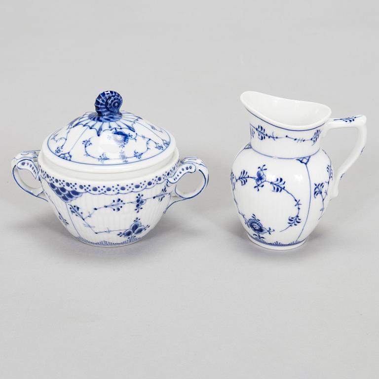 A set of thirty-two 'Musselmalet' porcelain pieces, Royal Copenhagen, Denmark.