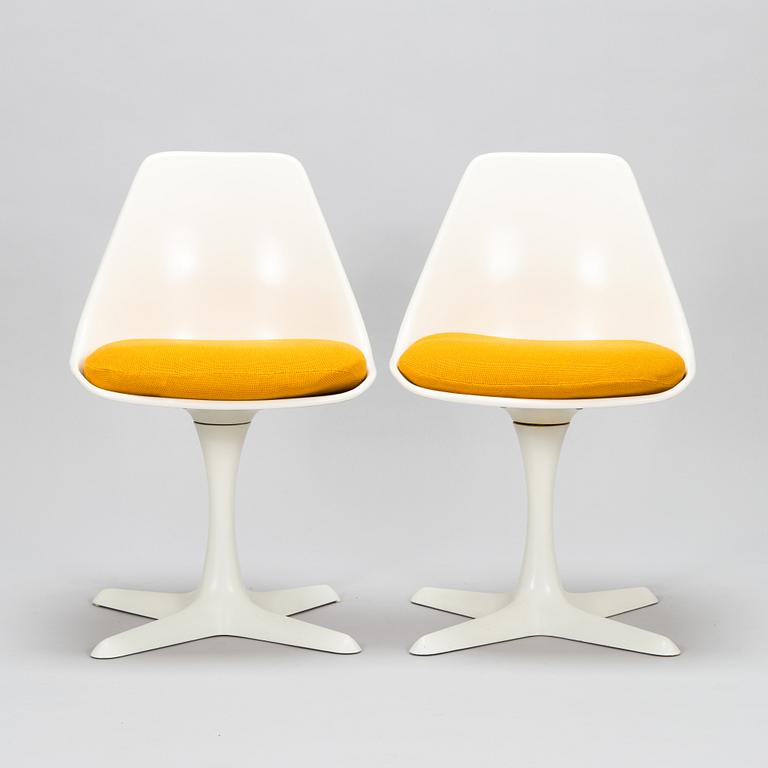 Set of 8 vintage swivel chairs model 115 and a table by Maurice Burke for Arkana, United Kingdom, 1960s.