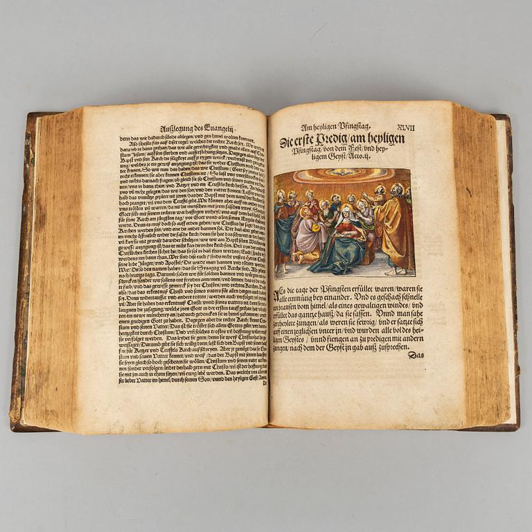 Martin Luther’s Haußpostil, 1553, with numerous coloured woodcuts.