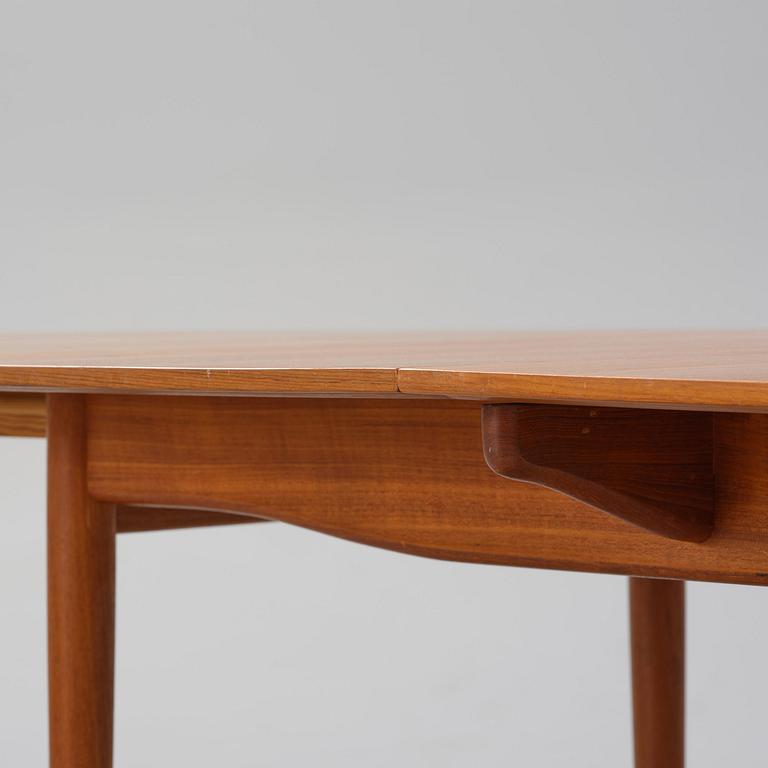 Finn Juhl, a teak dining table, Niels Vodder, Denmark, 1960s.