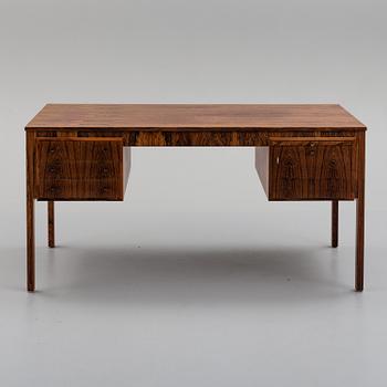 A 1950s/1960s writing desk by Erik Wörtz.