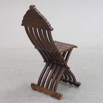 An early 20th century folding chair from the ottoman empire.