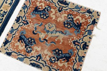 Two Chinese carpet fragments, late Qing dynasty.