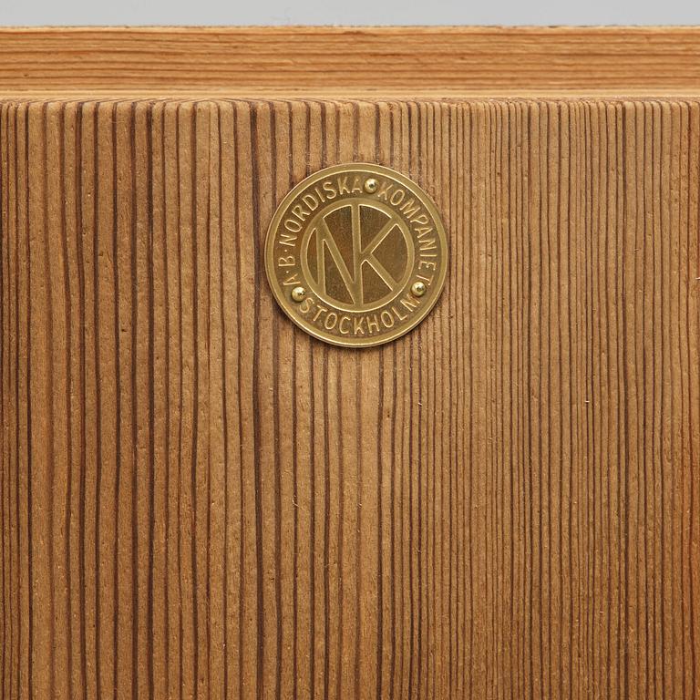 Axel Einar Hjorth, a stained pine "Sandhamn" corner cabinet, Nordiska Kompaniet, Sweden, 1931.