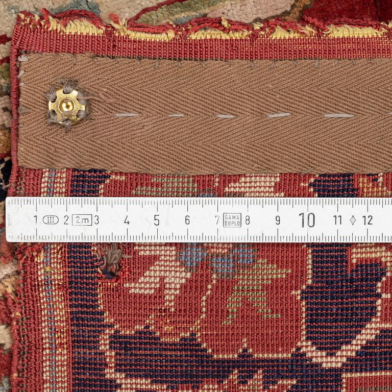 An antique Anatolian silk rug, c. 183 x 120 cm.
