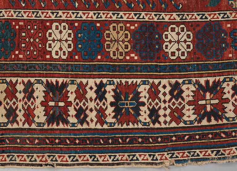 A CARPET, an antique Shirvan, Czar Russia, ca 277-288,5 x 139-140 cm (as well as 1 cm flat weave at the ends).