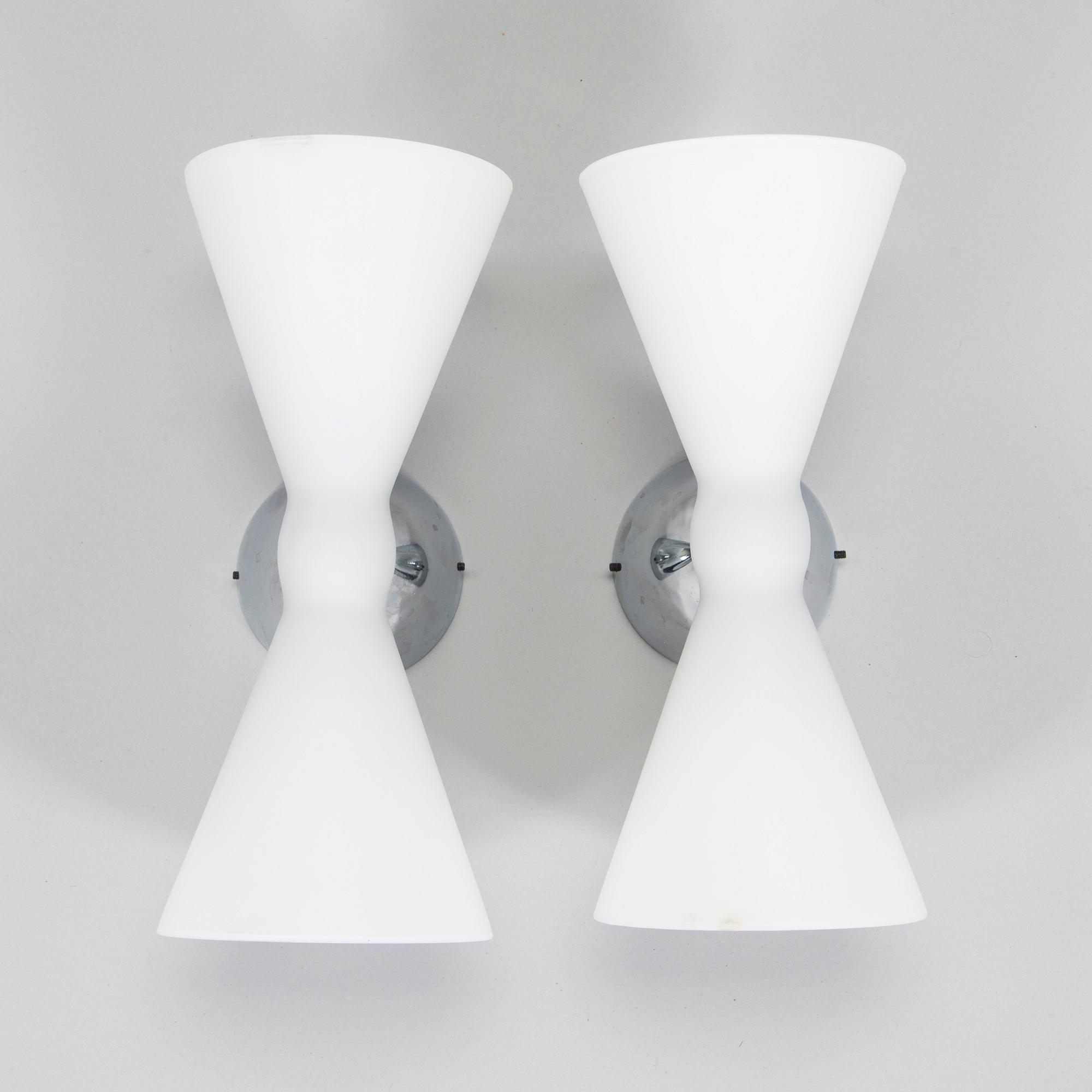 A pair of early 2000s wall lamps.