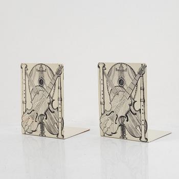 Piero Fornasetti, bookend "Strumenti Musicali", mid-20th century.