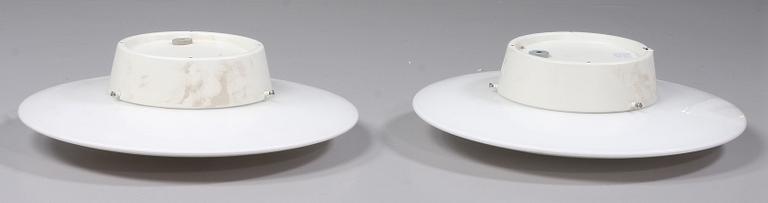 VÄGGLAMPOR, ett par, "AJ-Eklipta", nr 32012, Arne Jacobsen, Louis Poulsen.