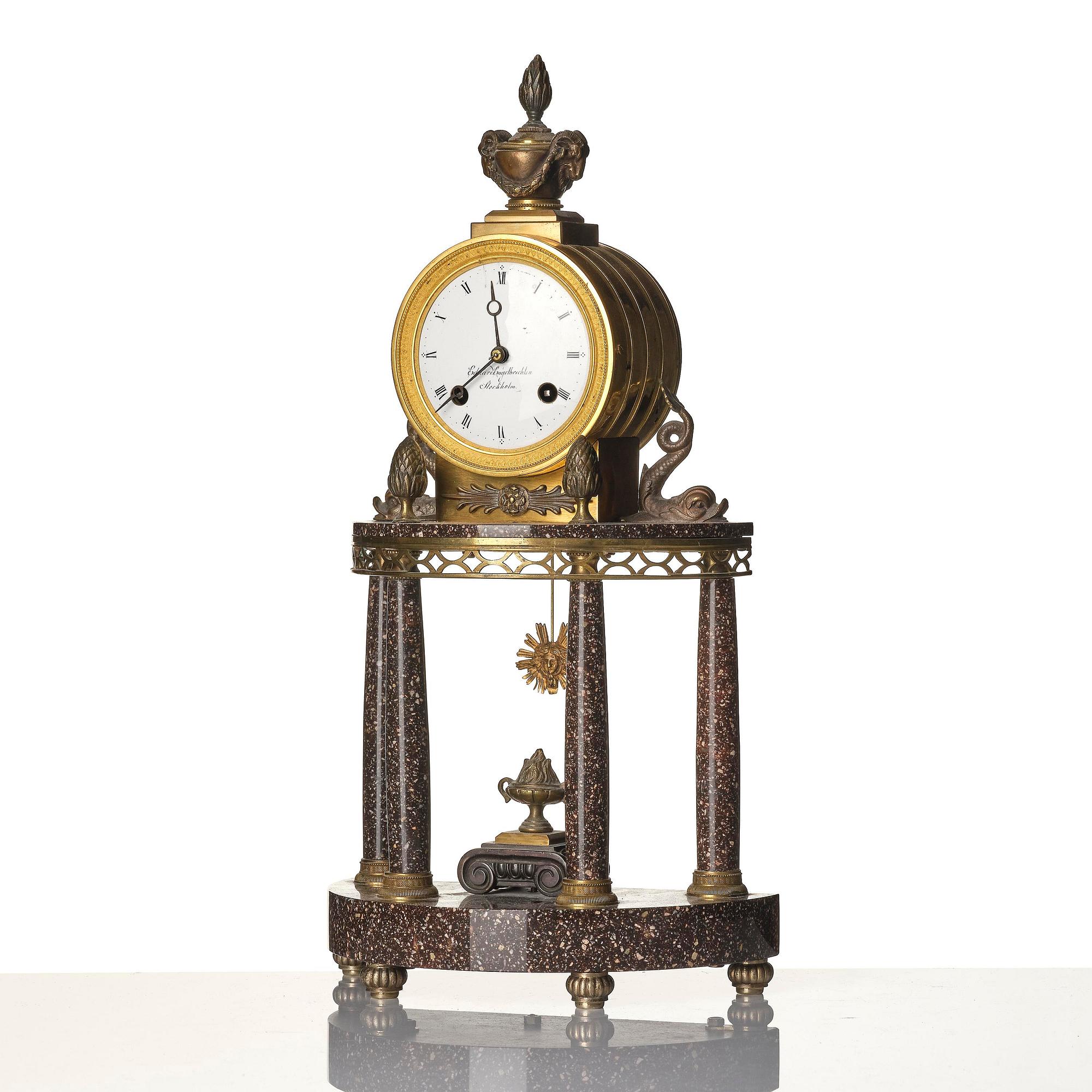 A late Gustavian ormolu and 'Blyberg' porphyry portico clock by E. Engelbrechten (watchmaker in Stockholm 1815-45).