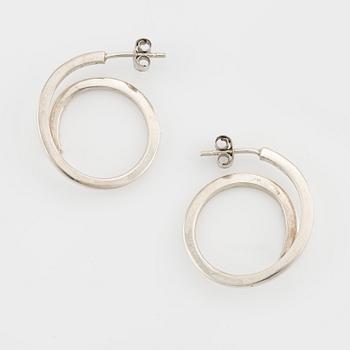 Efva Attling three pair of silver earrings.