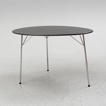 An Arne Jacobsen "Centenary Package" comprising three "Ant Chairs" and an eggshaped table, Fritz Hansen, Denmark.