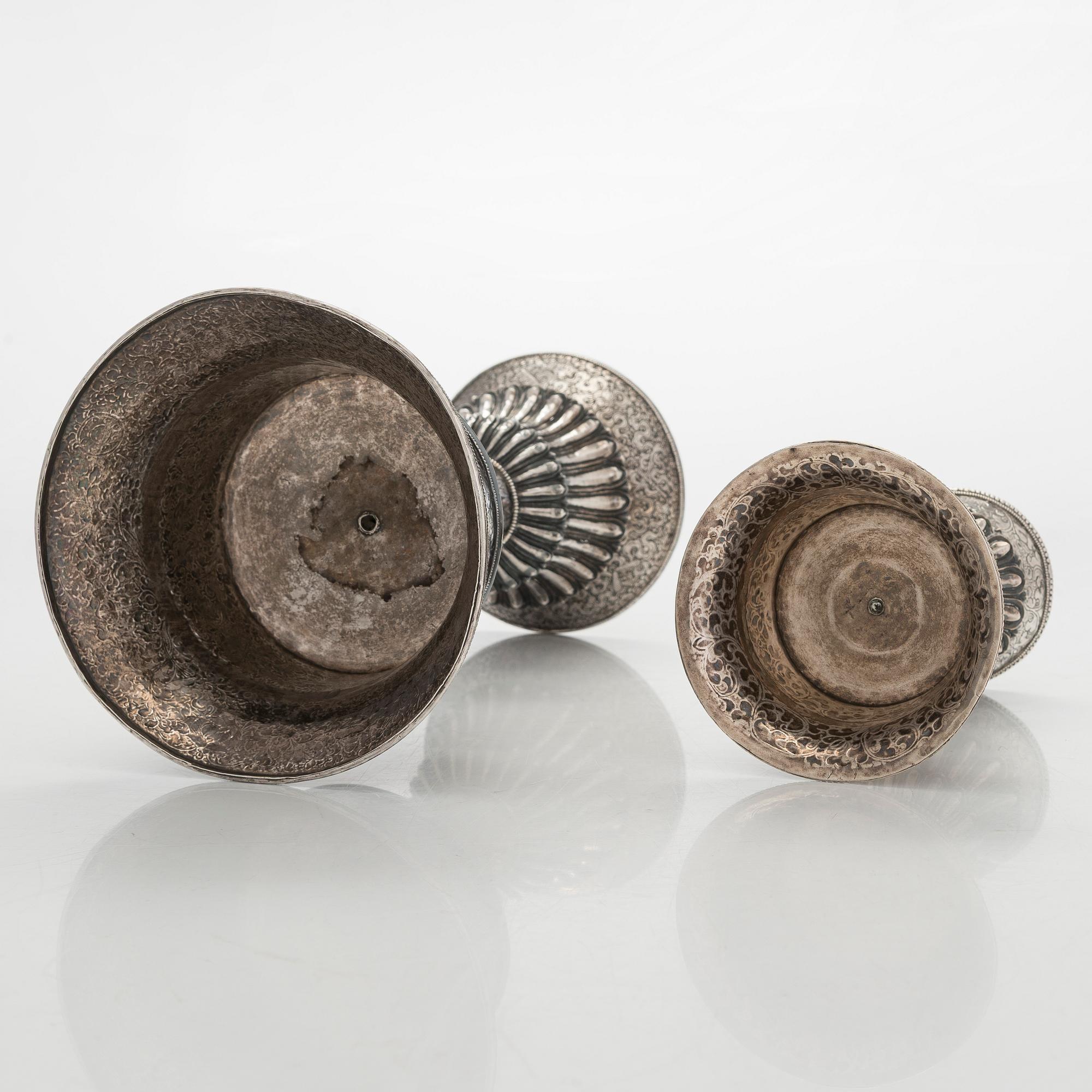 Two silver butter lamps, Tibet, 19th century.