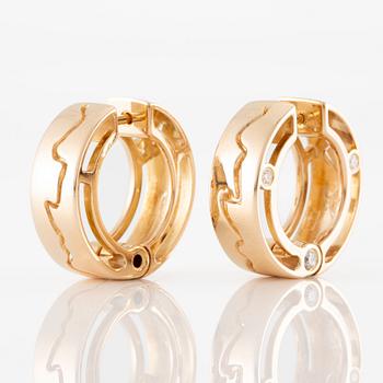 Earrings, a pair, hoops, 18K gold with brilliant-cut diamonds, designed by Eva Öberg Alte.