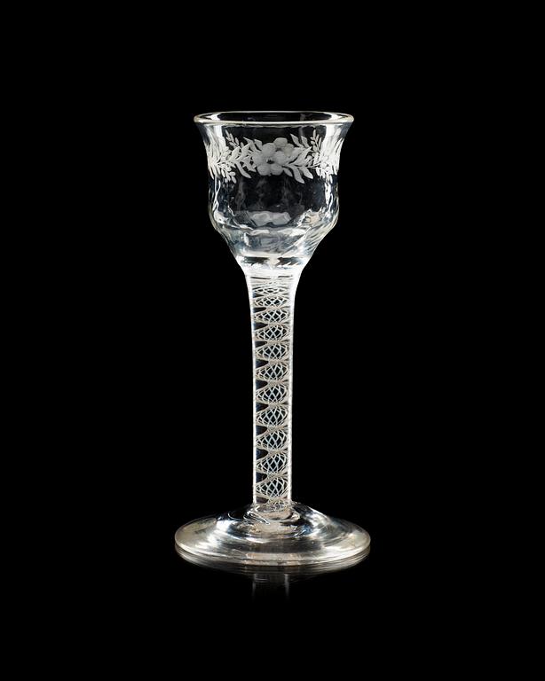 An engraved wine glass, 18th Century, presumably English.