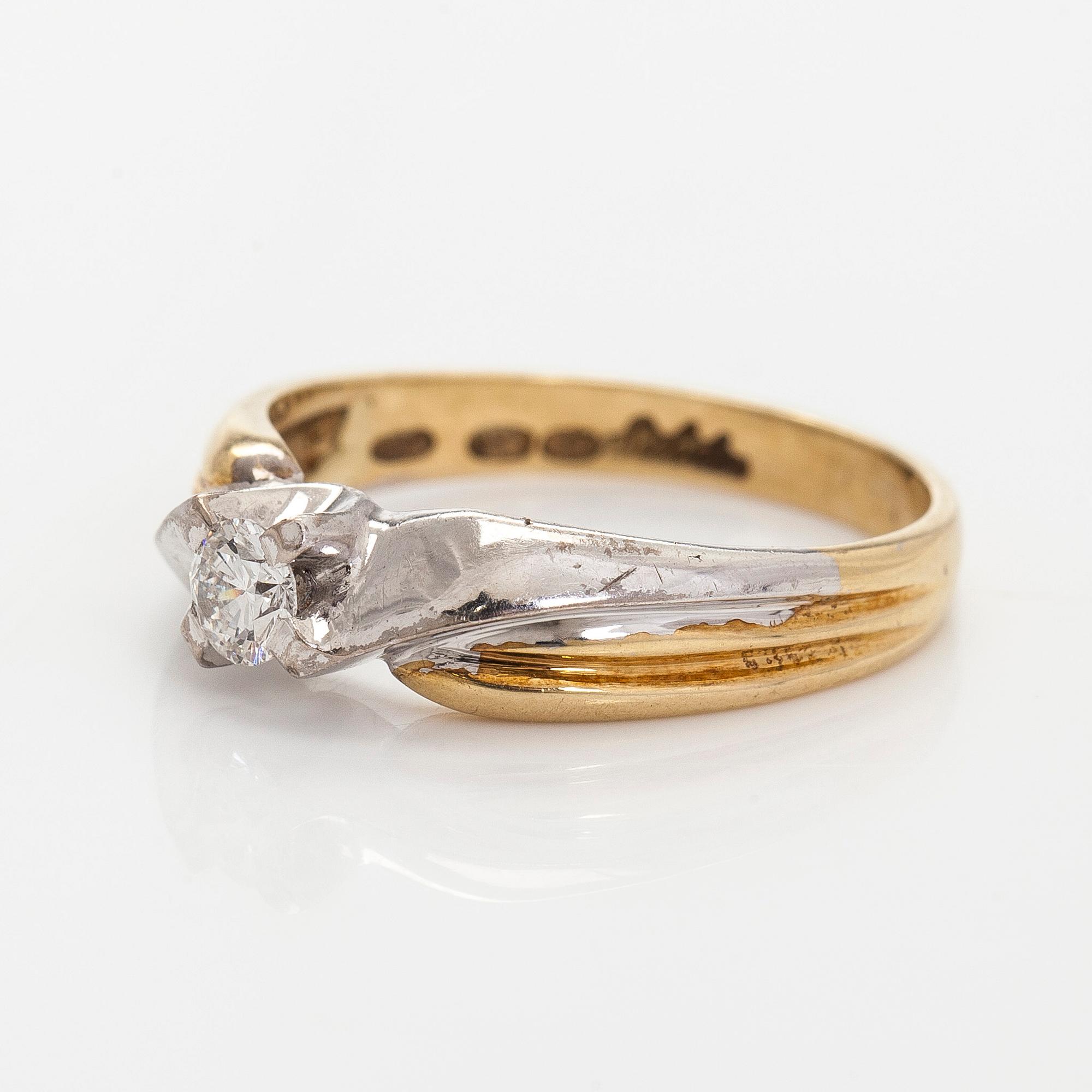 Ring, briljantslipad diamant 14K guld och vitguld, Silván, Helsingfors 1997.