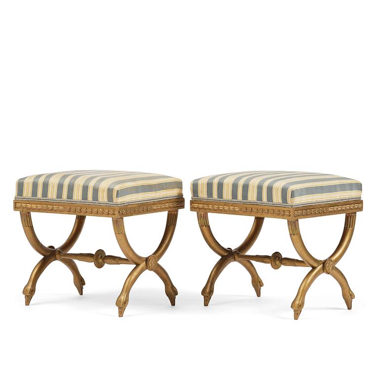 A pair of late Gustavian stools attributed to E. Ståhl (master in Stockholm 1794-1820).