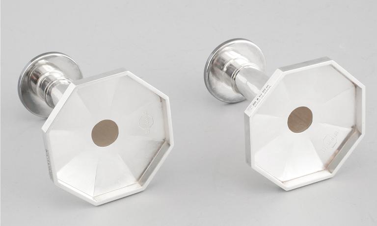 A pair of silver candelsticks by Bengt Liljedahl, STockholm, 1978.
